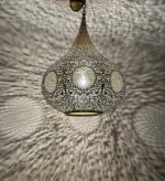 moroccan style lamps Handcrafted brass chandelier Moroccan brass chandelier Brass ceiling light fixture Brass dining room chandelier Industrial brass chandelier Decorative ceiling lighting Classic brass chandelier Copper pendant lights Moroccan pendant lamps Artisan ceiling lamps Bohemian ceiling lights Engraved brass chandeliers Modern Moroccan lighting Luxury copper chandeliers Traditional Moroccan chandeliers Exotic ceiling fixtures Rustic Moroccan ceiling lights Vintage copper chandeliers Contemporary brass lighting Ornate ceiling lamps Moroccan lantern-style chandeliers Handcrafted copper ceiling fixtures