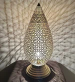 Moroccan brass table lamps Handcrafted brass lamps Moroccan table lighting Brass desk lamps Moroccan-style lamps Bohemian brass lamps Antique Moroccan lamps Decorative brass table lamps Artisan brass lamps Vintage Moroccan lighting Moroccan bedside lamps Intricate brass lamps Moroccan accent lighting Brass lantern table lamps Traditional Moroccan lamps