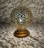 Moroccan brass table lamps Handcrafted brass lamps Moroccan table lighting Brass desk lamps Moroccan-style lamps Bohemian brass lamps Antique Moroccan lamps Decorative brass table lamps Artisan brass lamps Vintage Moroccan lighting Moroccan bedside lamps Intricate brass lamps Moroccan accent lighting Brass lantern table lamps Traditional Moroccan lamps