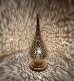 Moroccan brass table lamps Handcrafted brass lamps Moroccan table lighting Brass desk lamps Moroccan-style lamps Bohemian brass lamps Antique Moroccan lamps Decorative brass table lamps Artisan brass lamps Vintage Moroccan lighting Moroccan bedside lamps Intricate brass lamps Moroccan accent lighting Brass lantern table lamps Traditional Moroccan lamps