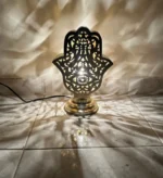 Moroccan brass table lamps Handcrafted brass lamps Moroccan table lighting Brass desk lamps Moroccan-style lamps Bohemian brass lamps Antique Moroccan lamps Decorative brass table lamps Artisan brass lamps Vintage Moroccan lighting Moroccan bedside lamps Intricate brass lamps Moroccan accent lighting Brass lantern table lamps Traditional Moroccan lamps
