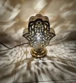 Moroccan brass table lamps Handcrafted brass lamps Moroccan table lighting Brass desk lamps Moroccan-style lamps Bohemian brass lamps Antique Moroccan lamps Decorative brass table lamps Artisan brass lamps Vintage Moroccan lighting Moroccan bedside lamps Intricate brass lamps Moroccan accent lighting Brass lantern table lamps Traditional Moroccan lamps