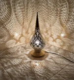Moroccan brass table lamps Handcrafted brass lamps Moroccan table lighting Brass desk lamps Moroccan-style lamps Bohemian brass lamps Antique Moroccan lamps Decorative brass table lamps Artisan brass lamps Vintage Moroccan lighting Moroccan bedside lamps Intricate brass lamps Moroccan accent lighting Brass lantern table lamps Traditional Moroccan lamps