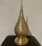 Moroccan brass table lamps Handcrafted brass lamps Moroccan table lighting Brass desk lamps Moroccan-style lamps Bohemian brass lamps Antique Moroccan lamps Decorative brass table lamps Artisan brass lamps Vintage Moroccan lighting Moroccan bedside lamps Intricate brass lamps Moroccan accent lighting Brass lantern table lamps Traditional Moroccan lamps