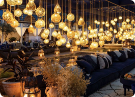 HOME Handcrafted Moroccan style lamps with intricate patterns, radiating a warm and cozy ambiance.