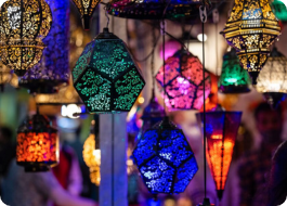 HOME Elegant handcrafted Moroccan style lamp with intricate details, casting a warm, ambient glow.