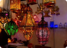 HOME Stunning handcrafted Moroccan style lamp with intricate patterns, creating a warm and inviting atmosphere.