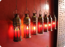 HOME Handcrafted Moroccan style lamp with intricate designs, casting a warm and enchanting glow.